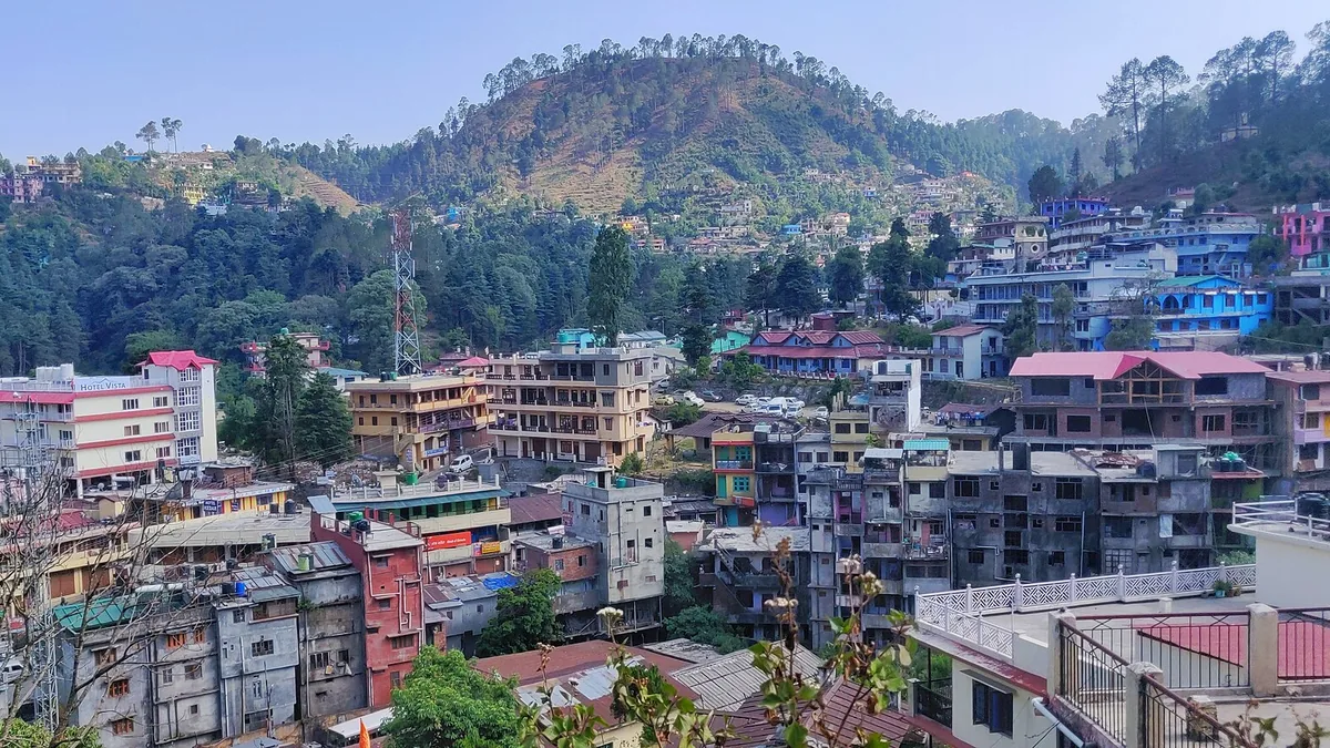 Bhowali Range Himalayan Mountain Valleys & Scenic Hillscapes in Bhowali Range, Uttarakhand – Delhi to Bhowali Range Urbania on rent for family & group tours