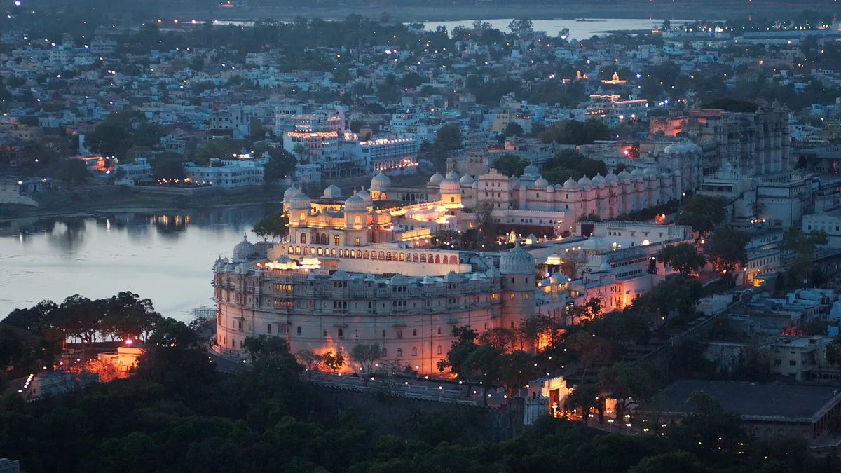 Lake Pichola & City Palace Marble Architecture in Udaipur, Rajasthan – Delhi to Udaipur Urbania on rent for family & group tours